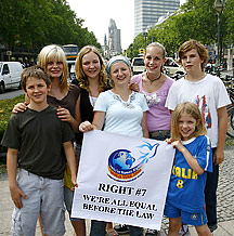 Members of the Berlin chapter of Youth for Human Rights International proclaim 'We're all equal before the law.'